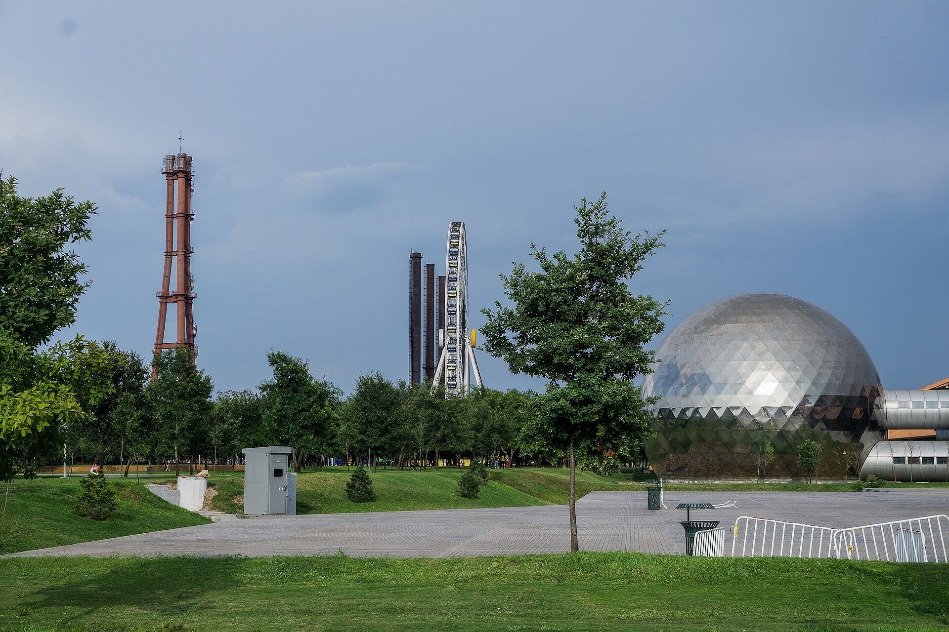 Parque Fundidora's preserved smokestacks and brick halls — the bones of Latin America's first integrated steel mill, kept standing instead of demolished.
